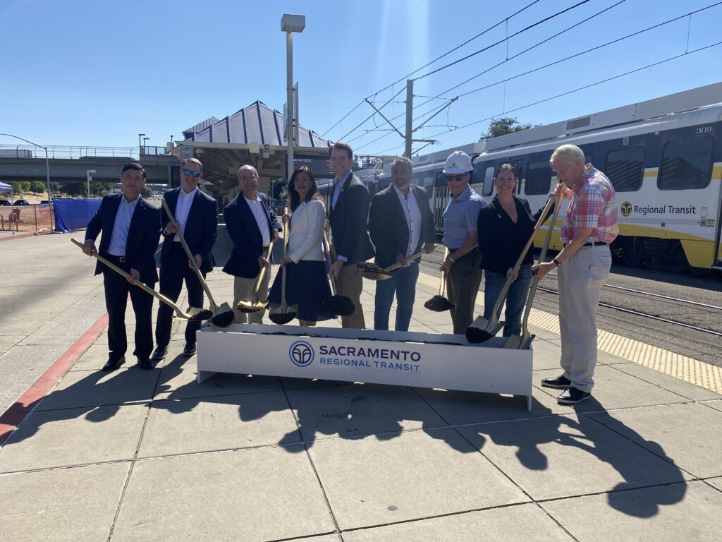 Image of box with dirt and shovels with the following pictured from left to right: SacRT General Manager/CEO Henry Li, Executive Director Placer County Transportation Planning Agency Matt Click, Senator Roger Niello, FTA Region 9 Deputy Administrator Amy Changchien, Congressman Kevin Kiley, Congressman Ami Bera, SacRT Board Chair Patrick Kennedy, SacRT Board Director Lisa Kaplan, and former SacRT Board Member Roger Dickinson. 